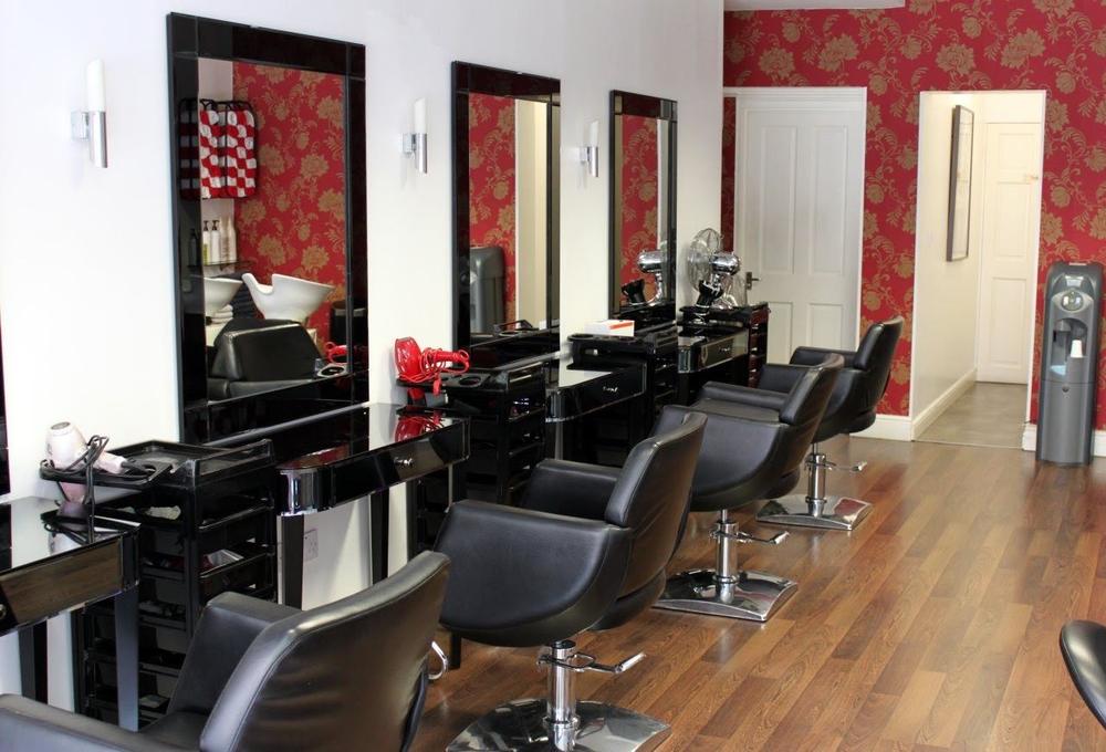 The salon’s styling chairs and mirrors